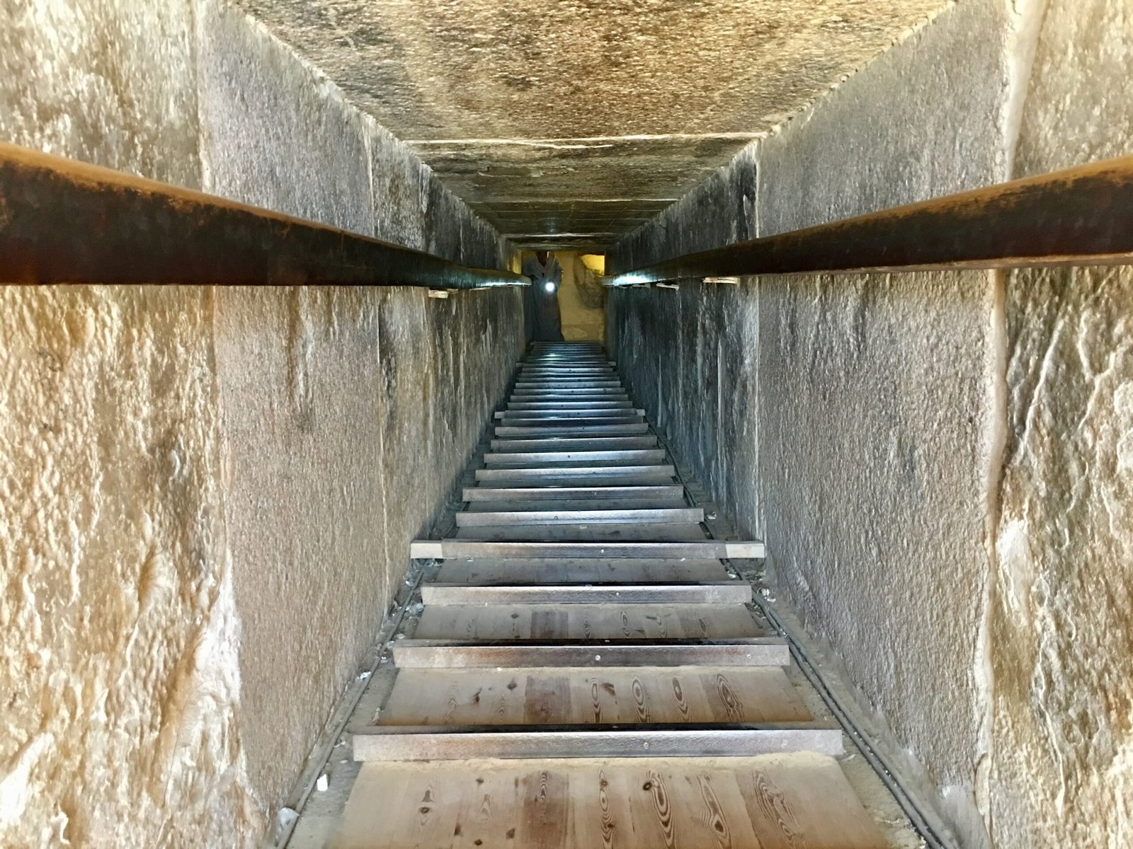 unnel descending into the burial chamber of the Pyramid of Djoser in Saqqara, Egypt.