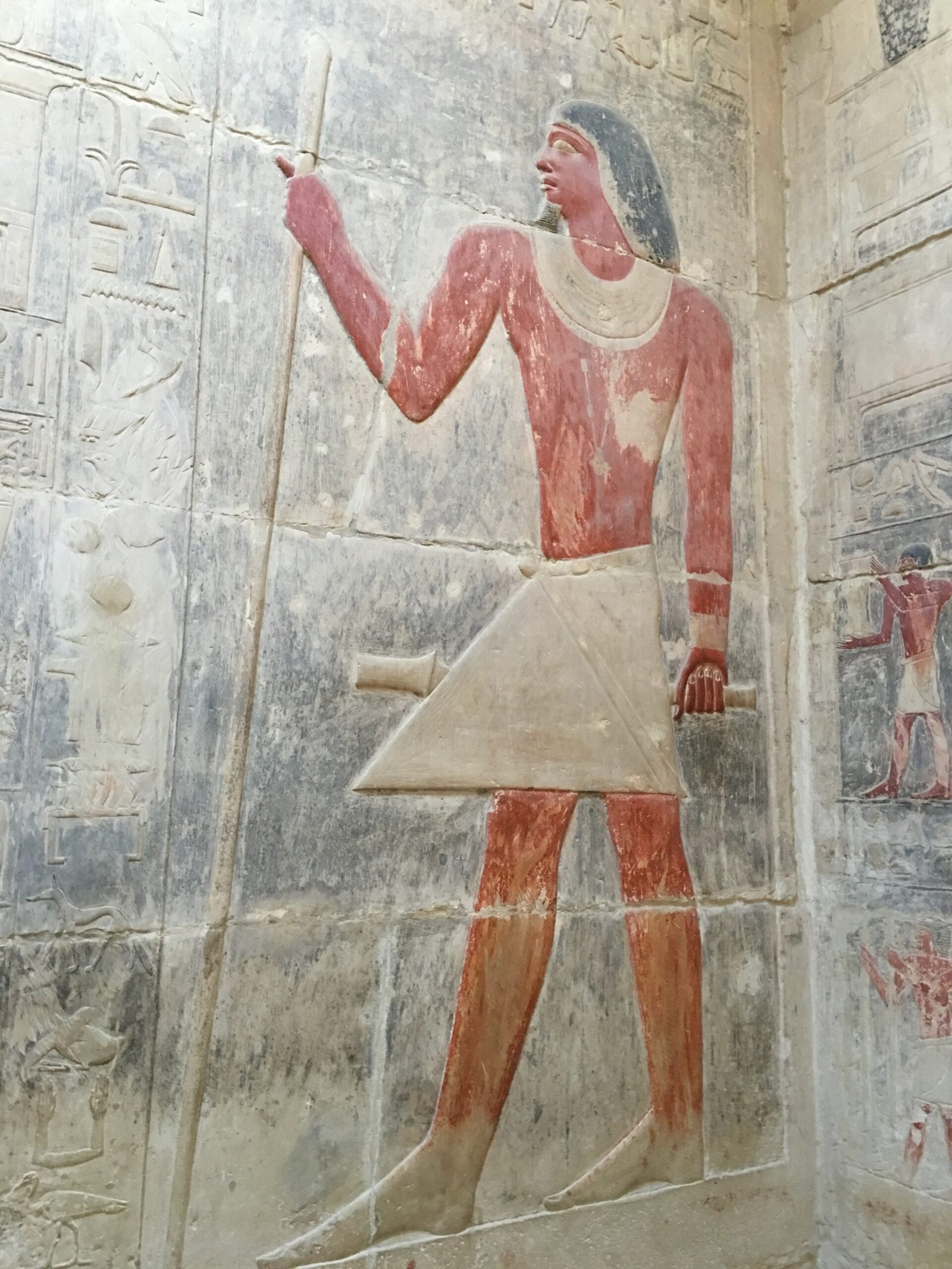 Painted hieroglyphics on the wall of the burial chamber inside the Pyramid of Djoser.