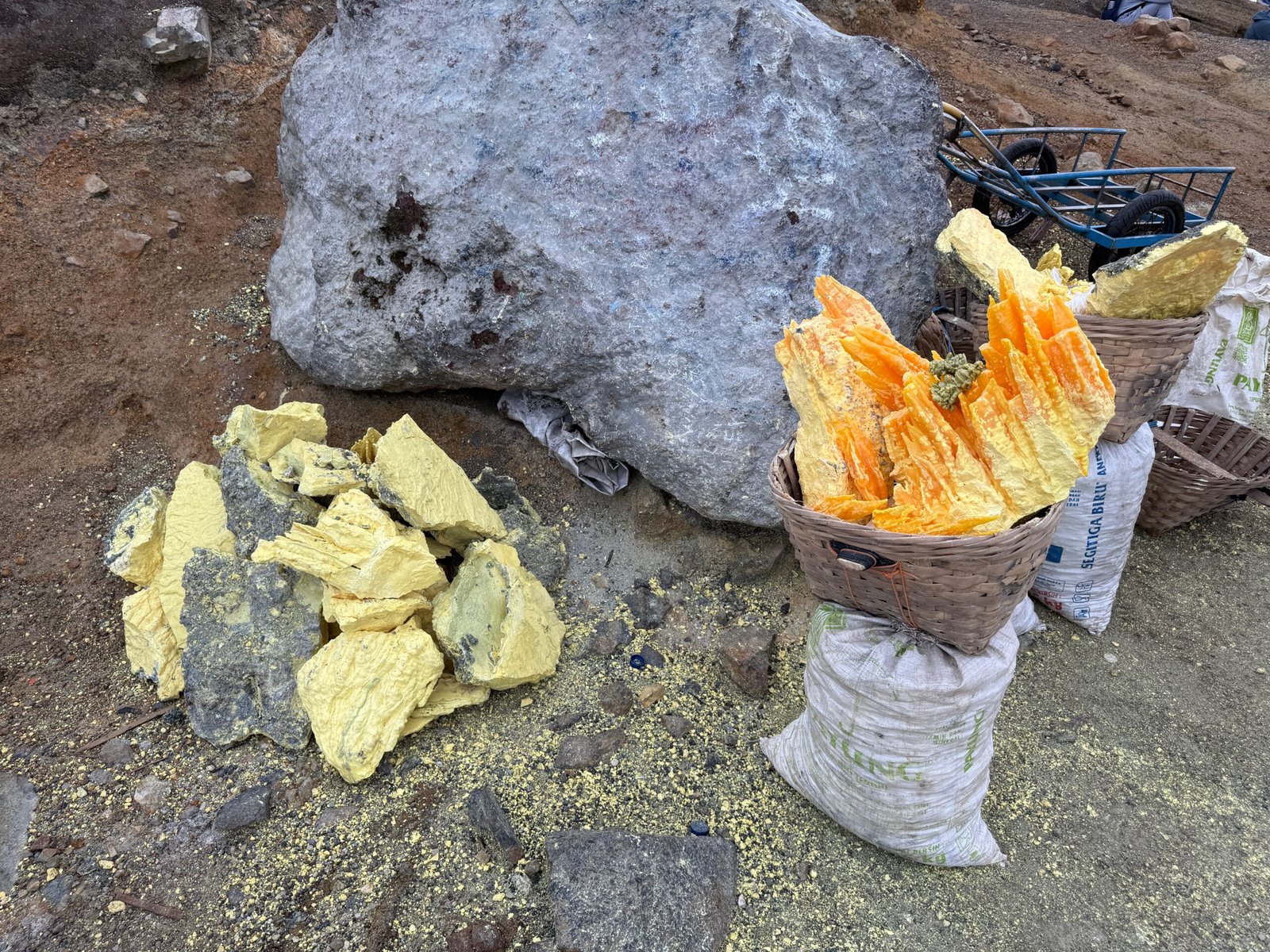 A closeup view of bright yellow sulfur chunks mined at the bottom of the Ijen Volcano caldera in Indonesia.