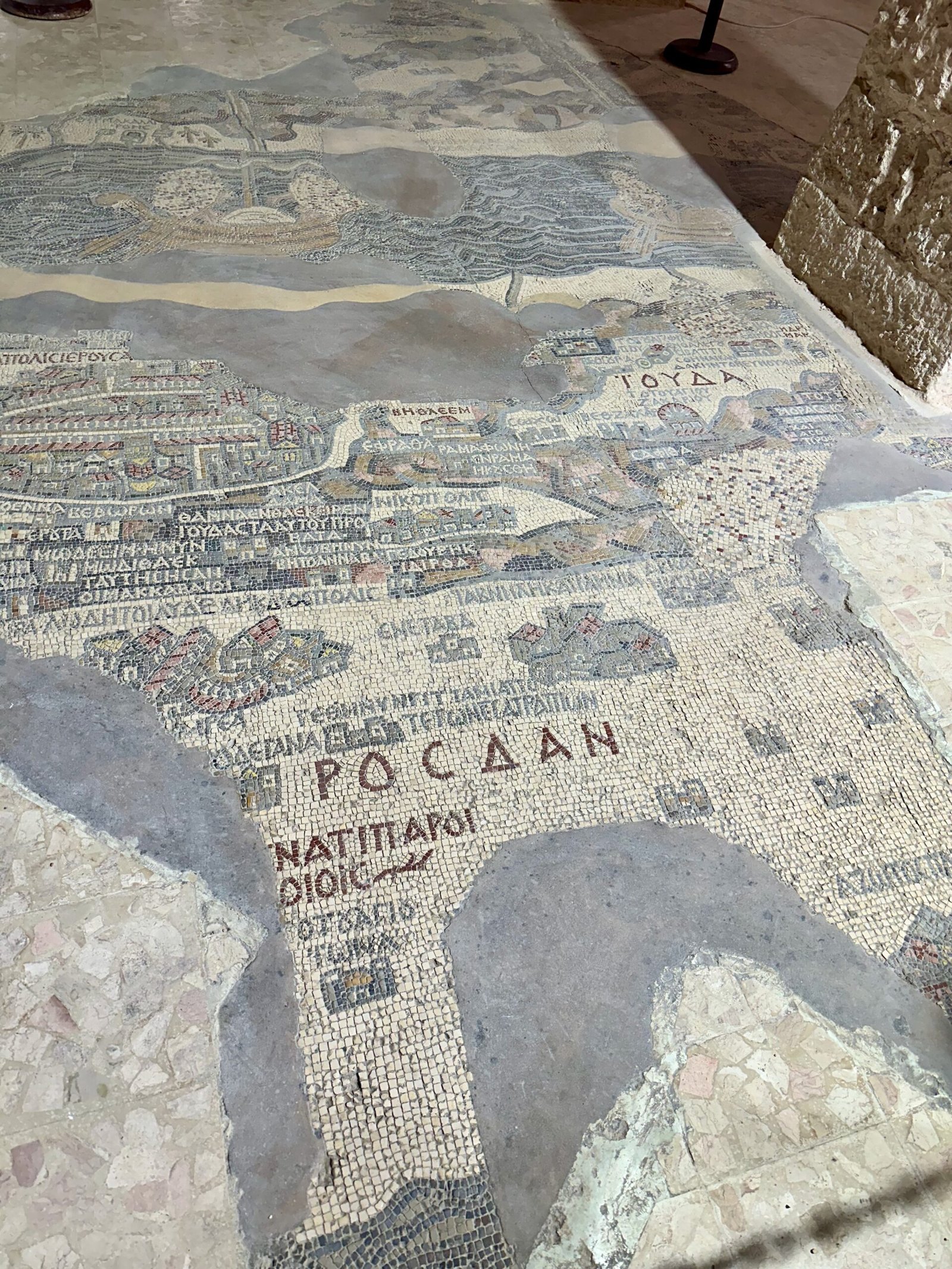 Photo of the ancient mosaic map on the floor of St. George’s Greek Orthodox Church in Madaba, Jordan, depicting the Holy Land with detailed artistry.